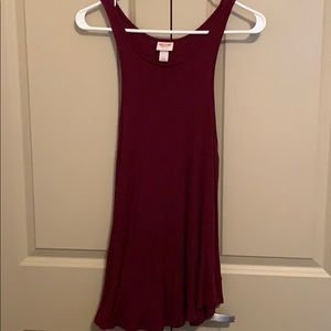 Maroon wife beater like tank top. Racer back .